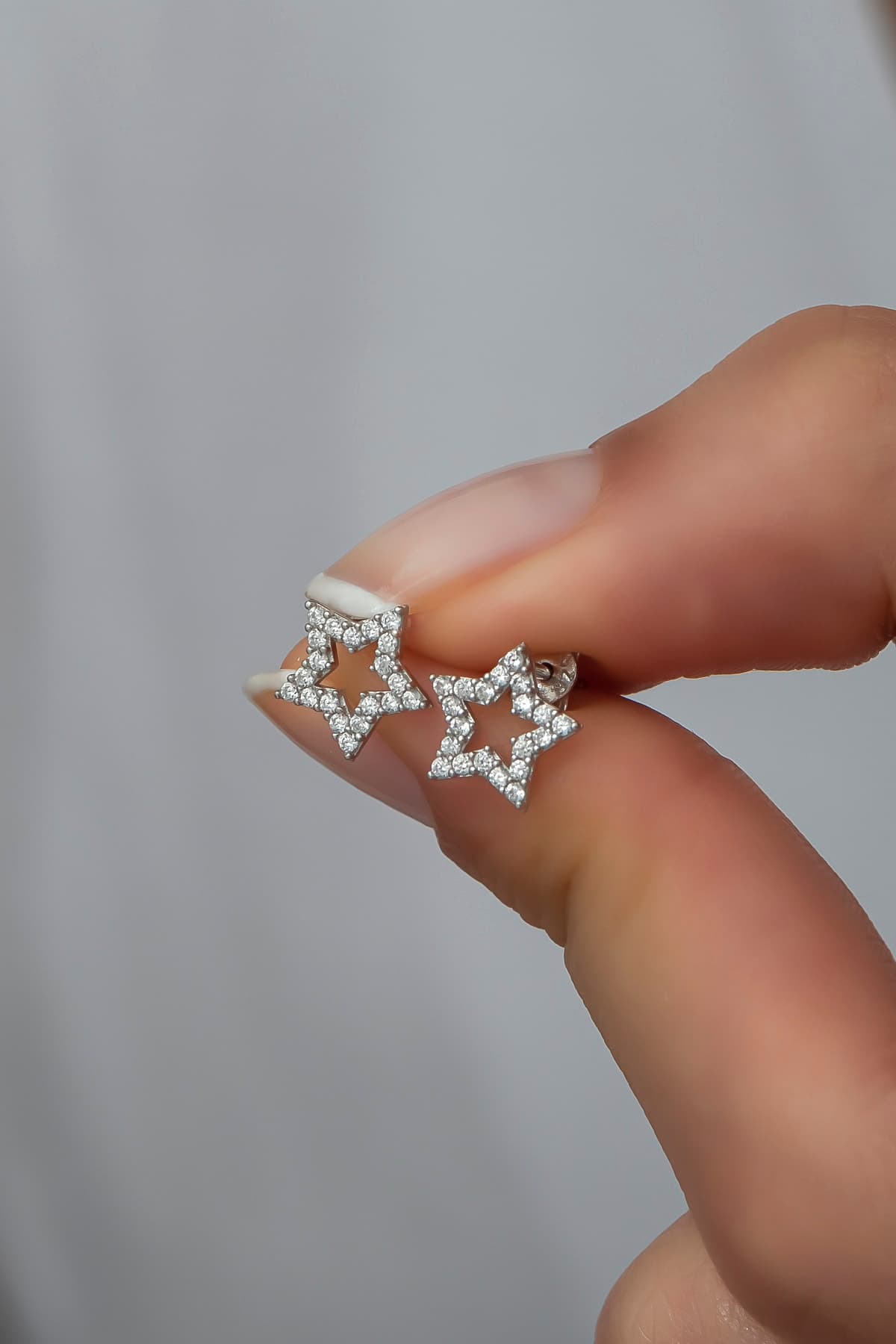 NEREZE 925 Ayar Gümüş Minik Rodyum Kaplama Yıldız Küpe